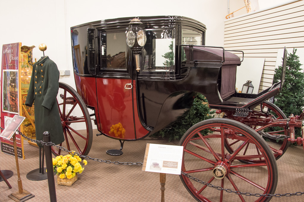 Clarence (Circa 1897); a coachman-driven vehicle seating 4 people.