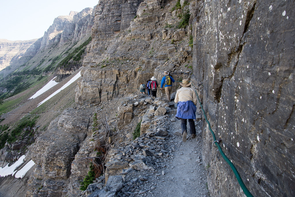 The trail starts on a cliff cut.